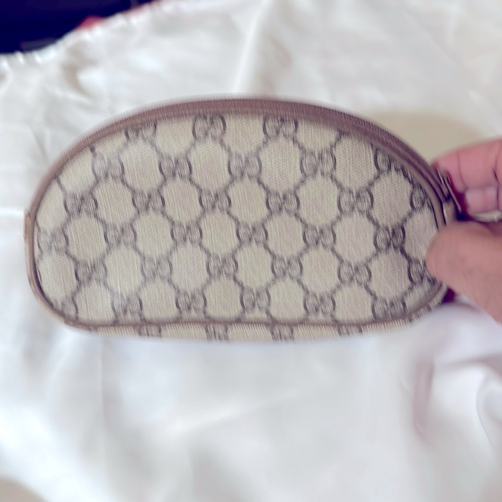 Gucci medium size make up bag.  GGMonogram in very good condition.